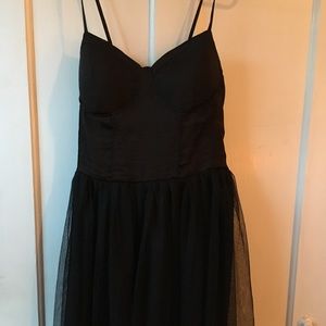 Mid length, black cocktail dress